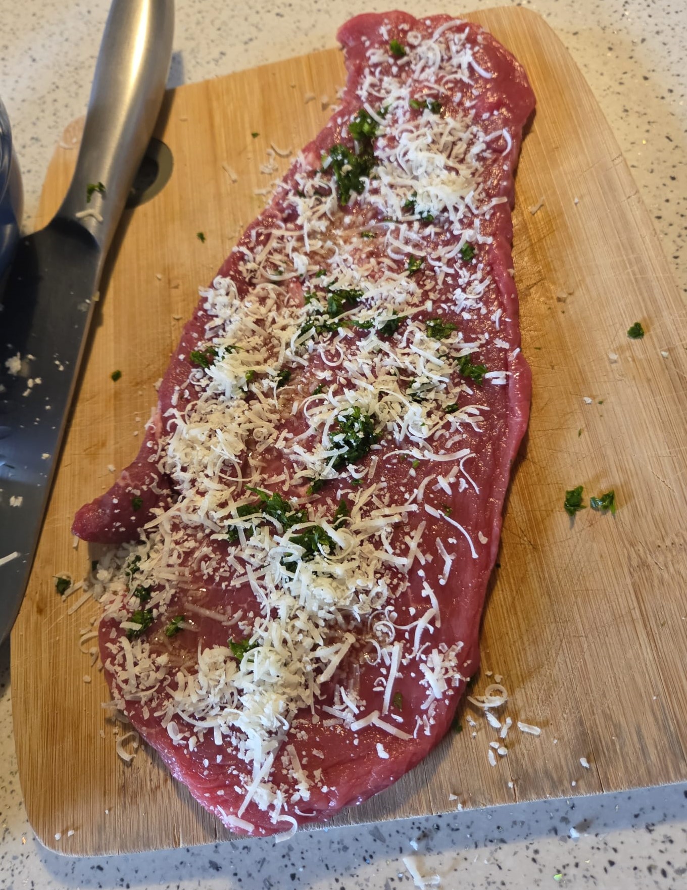 Open braciola with cheese and parsley filling