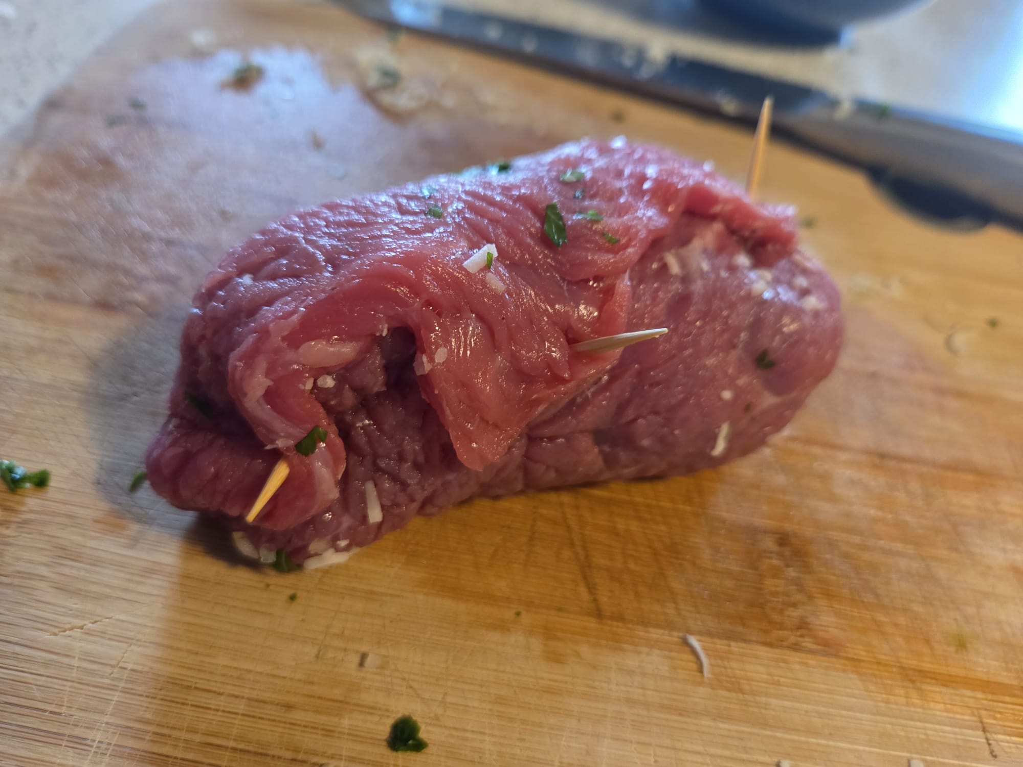 Rolled and closed braciola with toothpick